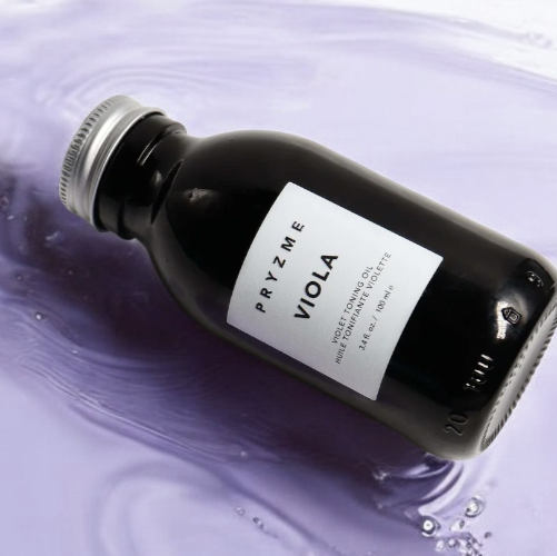 Bottle of Pryzme Viola oil on a purple background